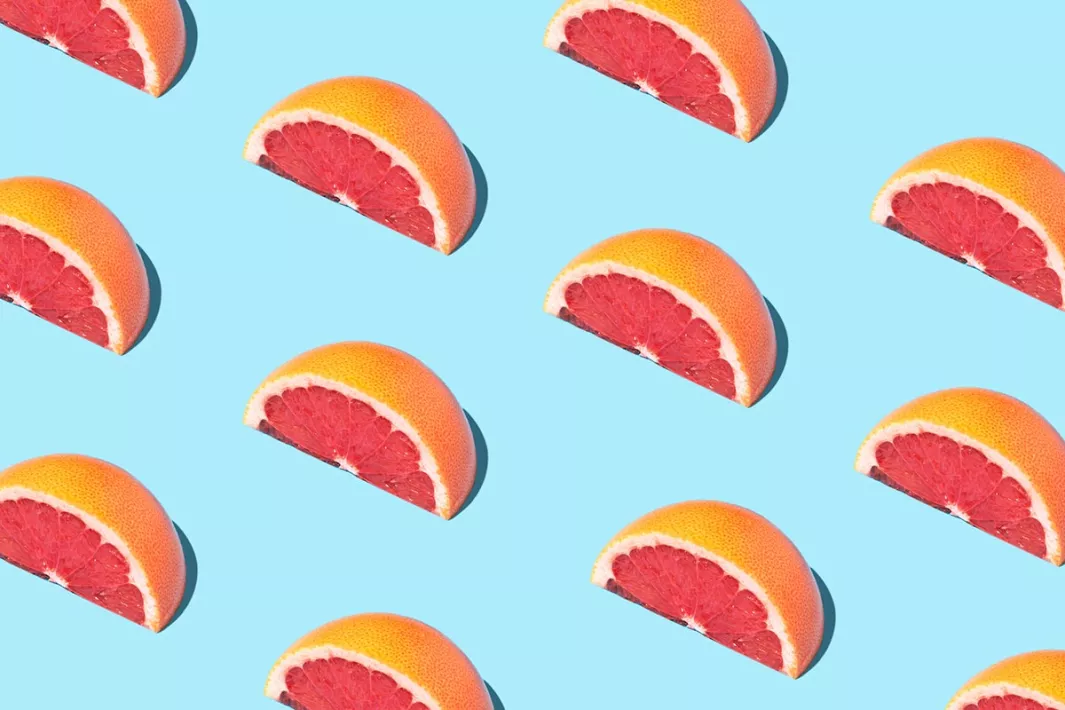 Grapefruit on blue background