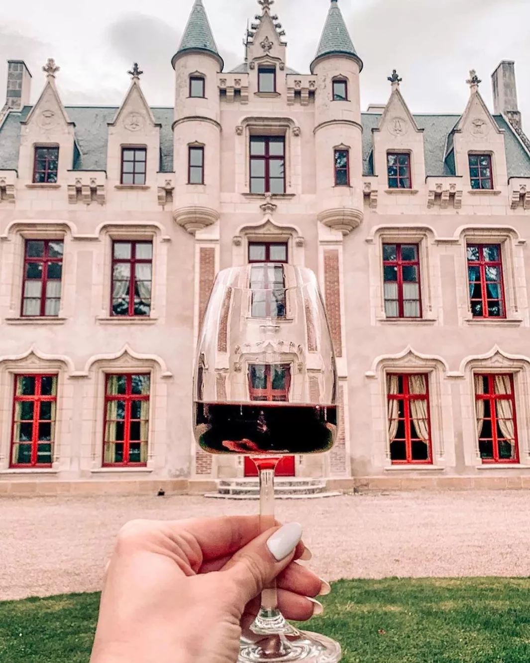 Château de la Grille and glass of Chinon wine