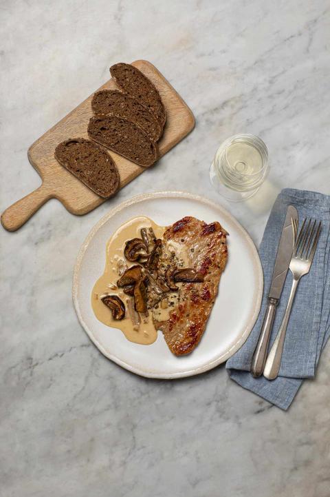 Veal scallops with creamy porcini mushroom sauce
