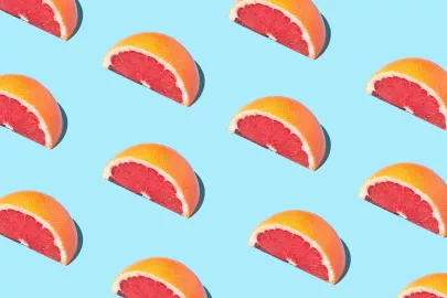 Grapefruit on blue background