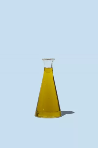 Olive oil and blue background 